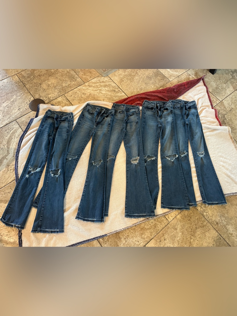 5 )American Eagle Dark Blue Distressed Women’s Jeans - Classic Flare